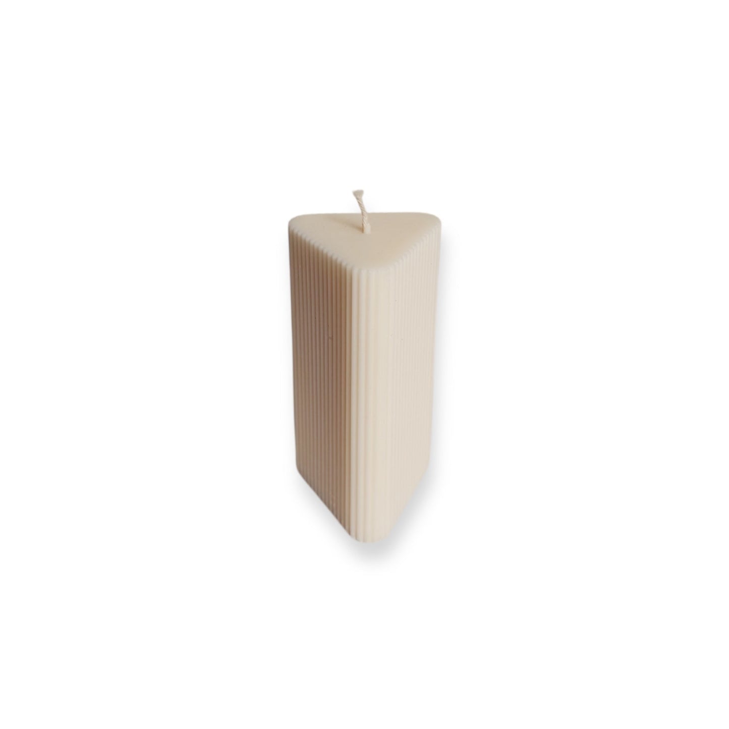 Regular ribbed triangular pillar candle on a white background